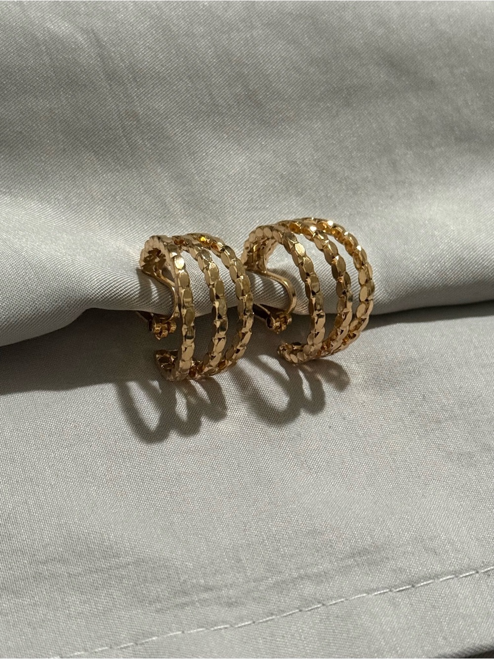 Gold tone Textured Triple Hoop Clip-On Earrings